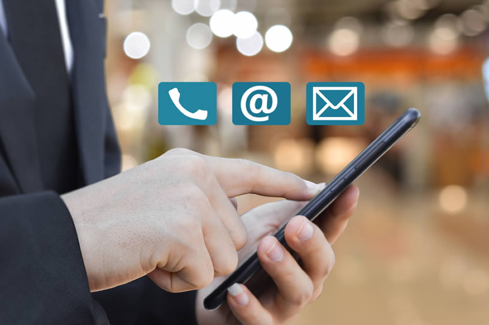 Person touching cell phone person touching cell phone